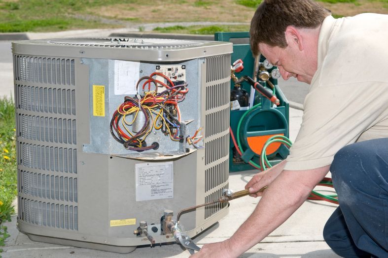 AC Blowing Out Warm Air